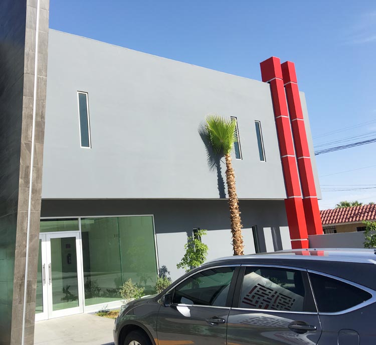 Car in front of New Hope Unlimited Building