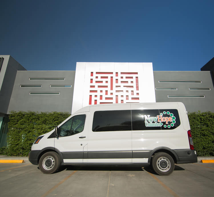 New Hope Unlimited Building Front View with Van New Hope Unlimited Building Front View with Van