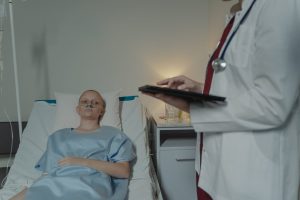 a cancer patient lying on the bed